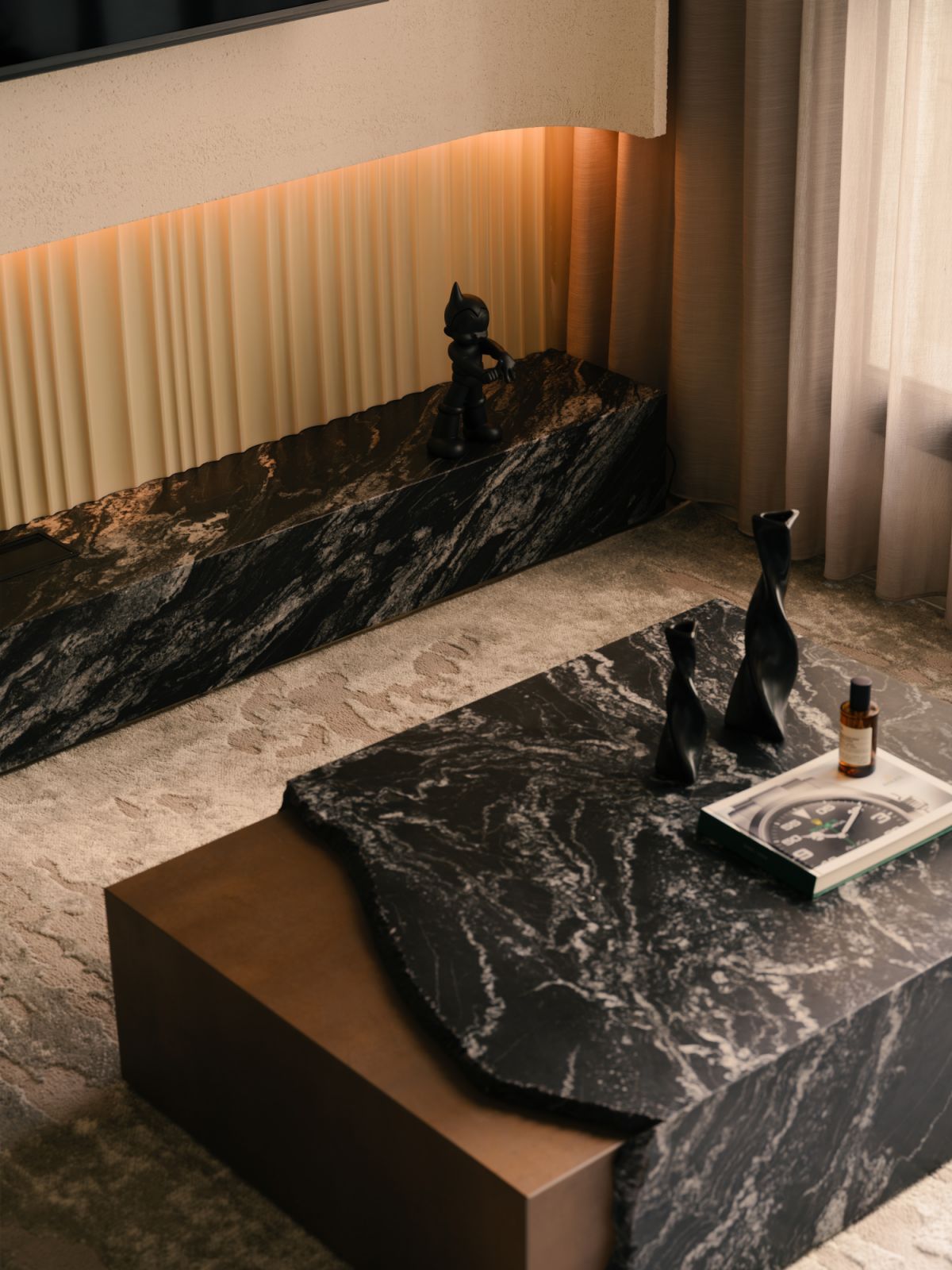 A closer look at the custom TV console and coffee table, where dynamic silhouettes and tactile finishes add drama to the softly lit space