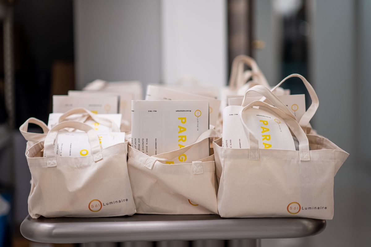Sol Luminaire goodie bag featuring an exclusive table lamp