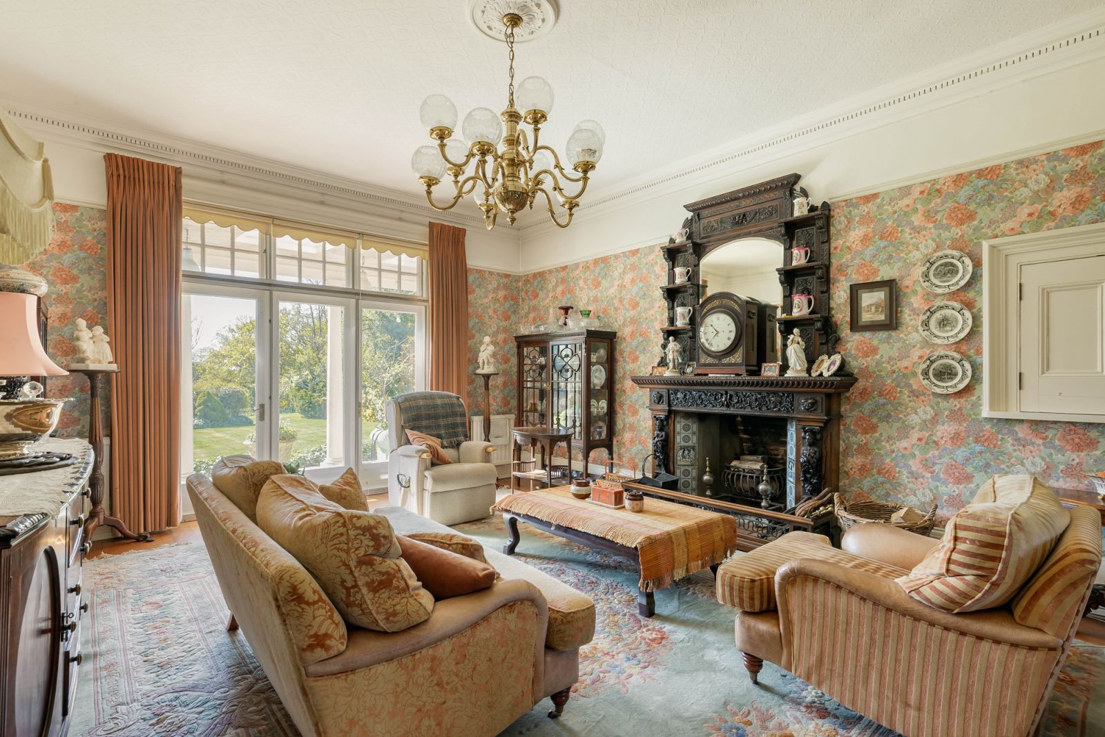 The main drawing room boasts an open fireplace