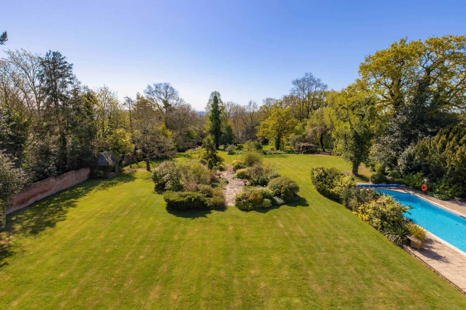 Mature trees surround the property to ensure privacy