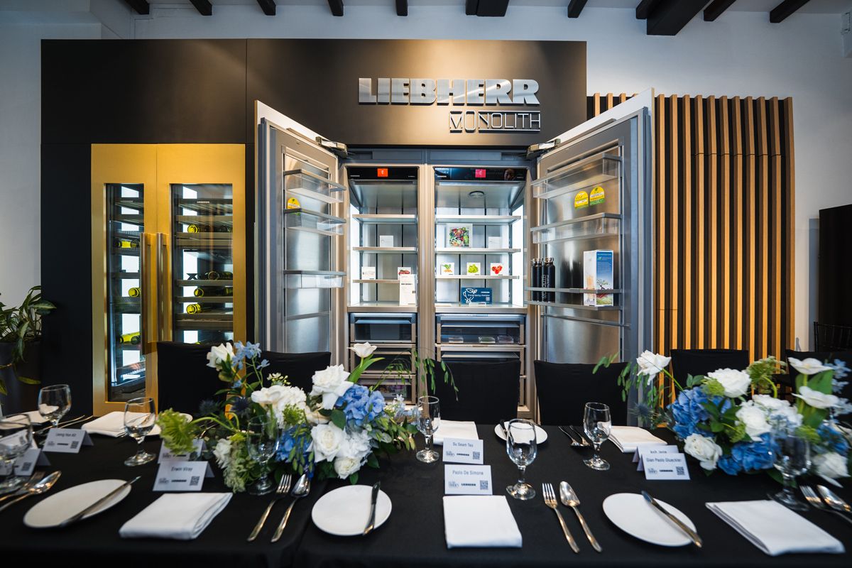 The Liebherr signature fridge presides over the dining table