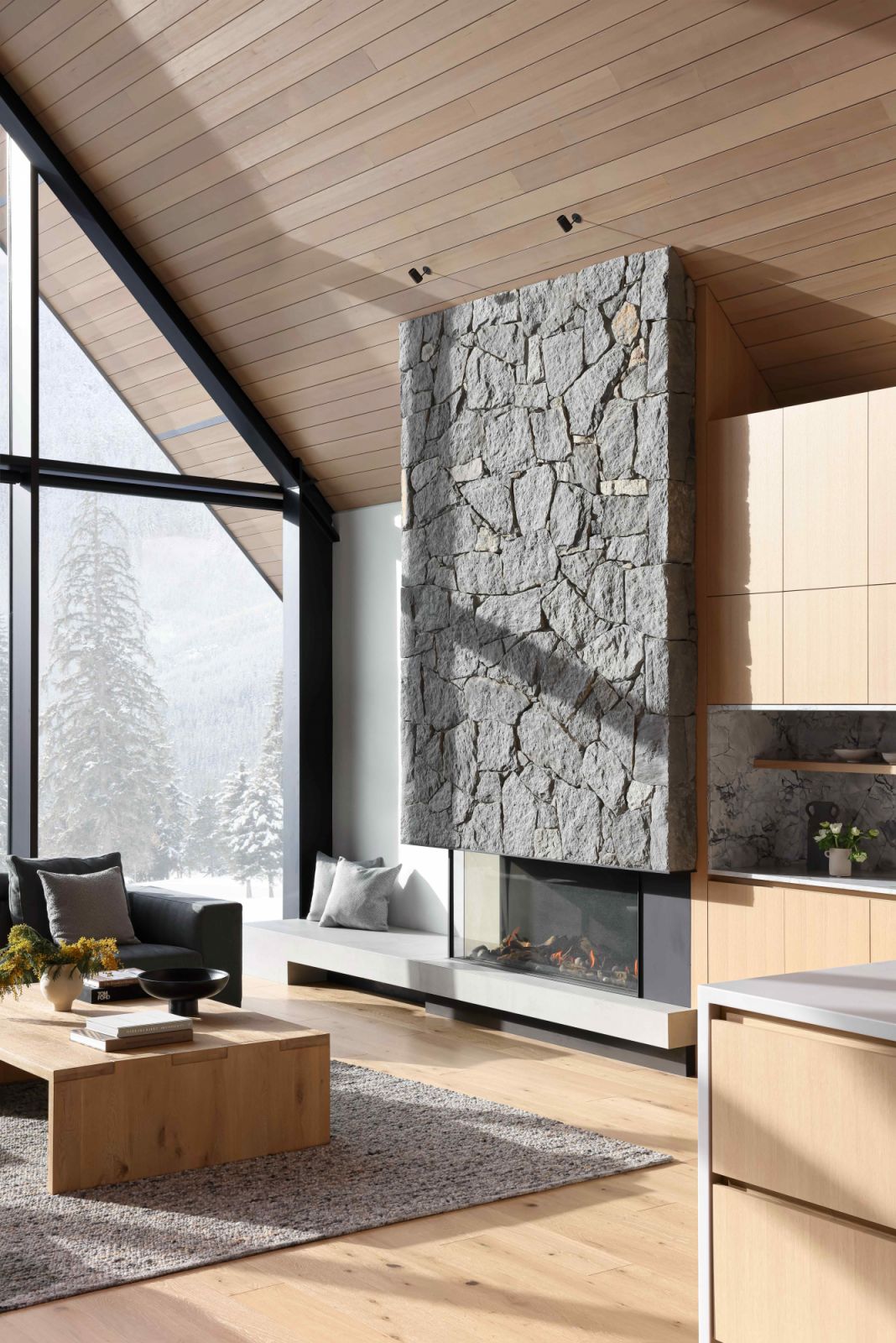 Locally sourced basalt and hemlock are the principal drivers for the interiors