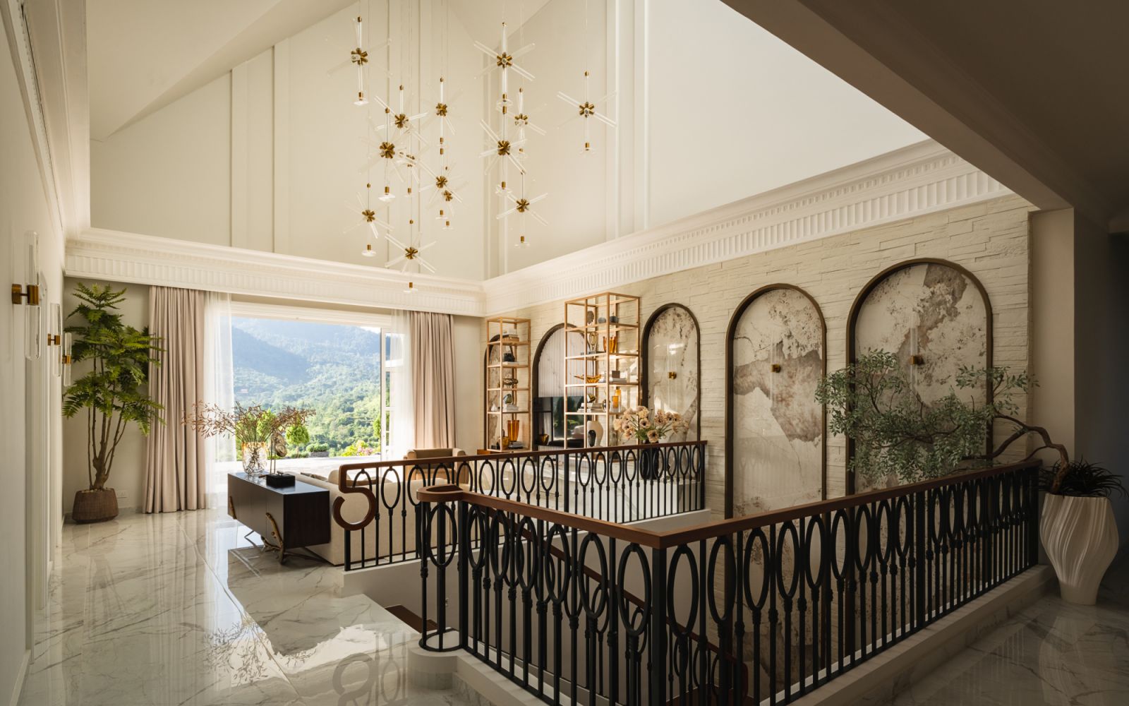 This upstairs seating nook takes full advantage of the elevated Batang Kali location, offering sweeping views of the Malaysian highlands through expansive windows