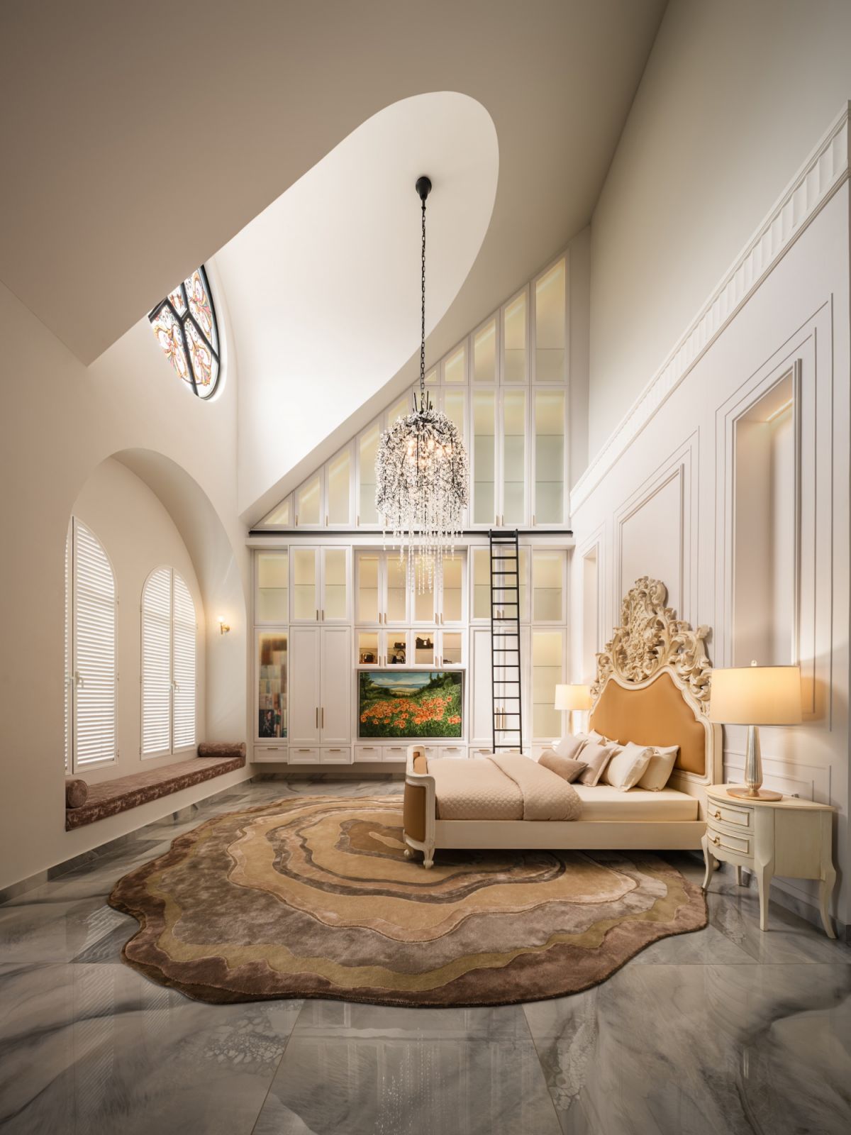 The bedroom at Puncak continues  the home’s elegant design language with its impressive ceiling height