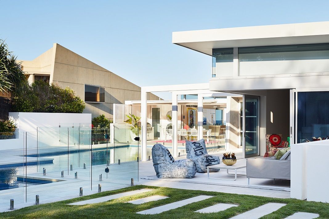 The property is akin to a beautiful white box perched on a hill with sharp, clean lines (Photo: Alicia Taylor)
