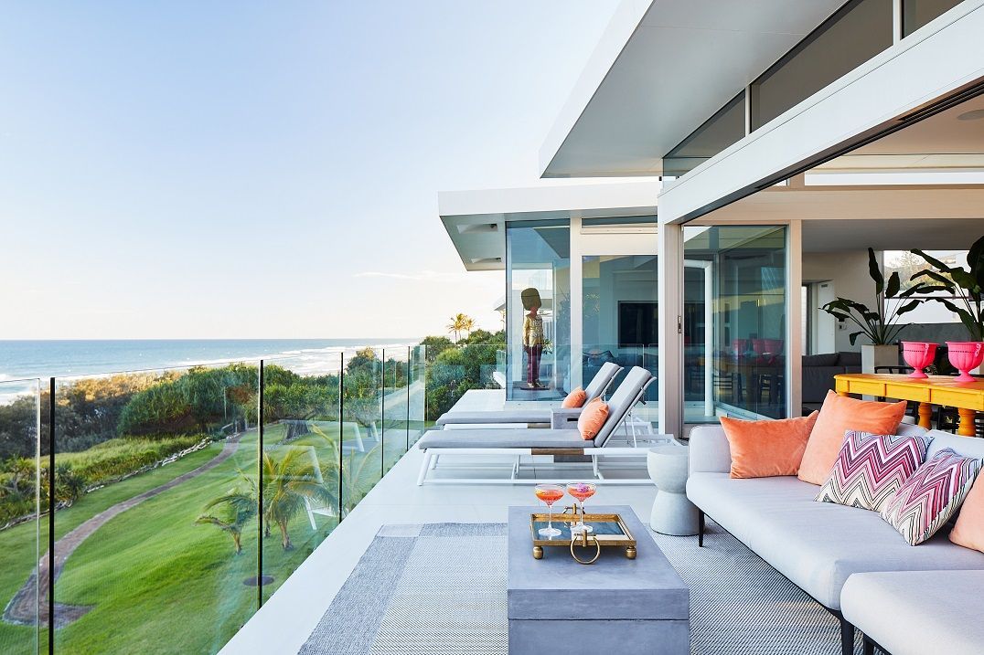 Large windows framing gorgeous ocean views while the outdoor terrace captures the lulling sounds of the sea (Photo: Alicia Taylor)
