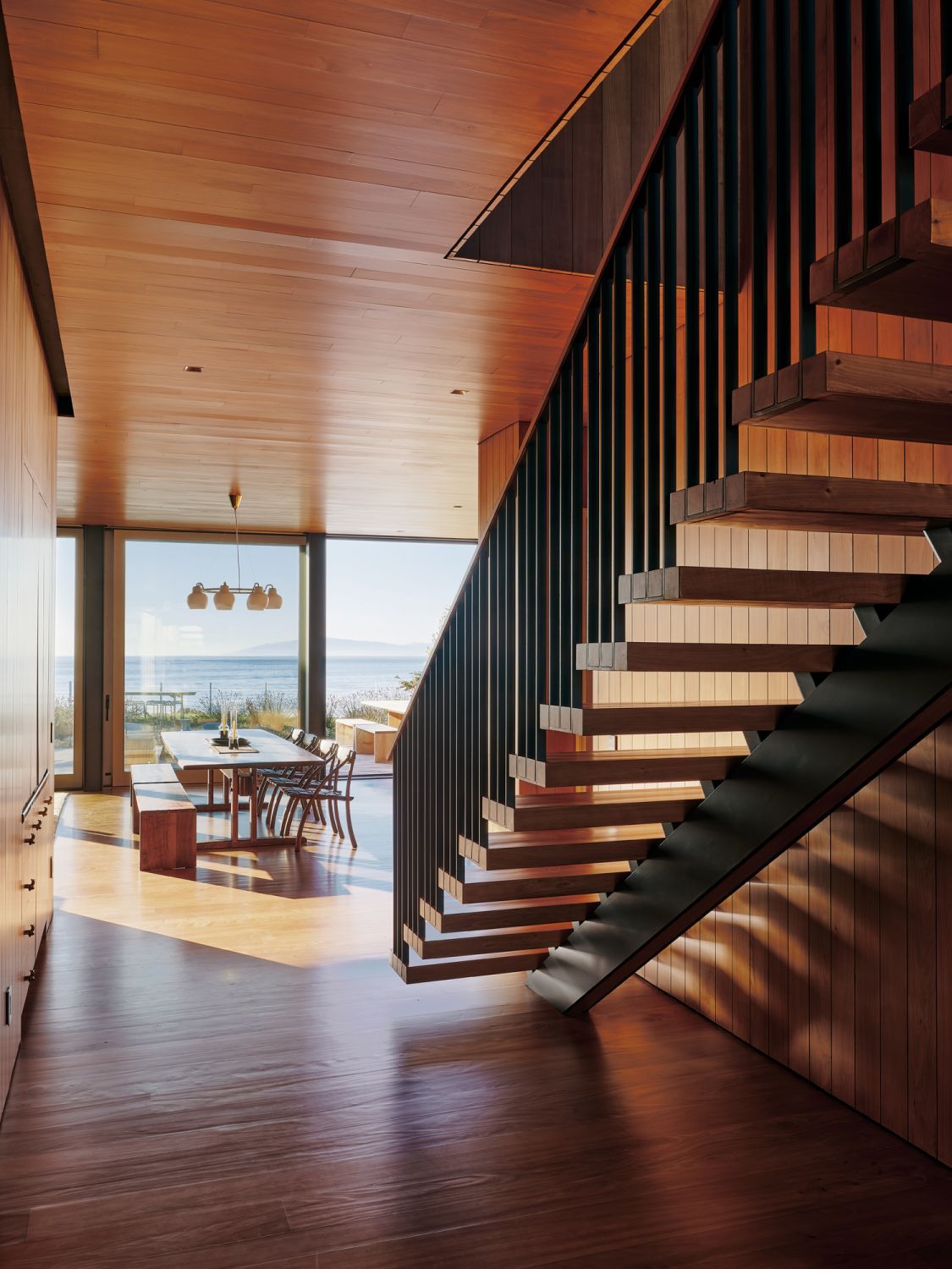 Glass doors complement the earth-toned interior (Photo: Joe Fletcher)