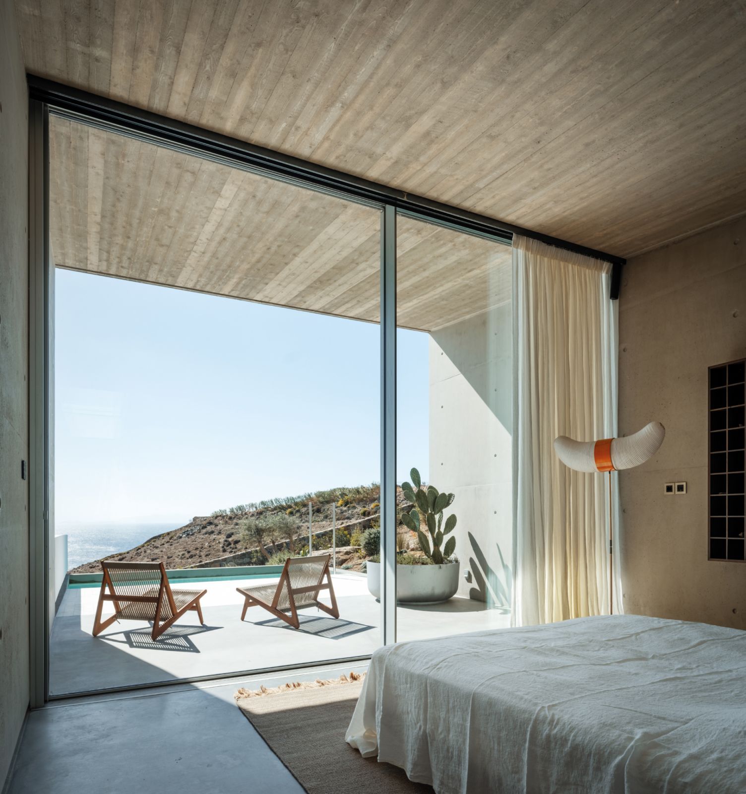 Unimpeded views of the pool and ocean from the bedroom (Photo: Mike Kelley)