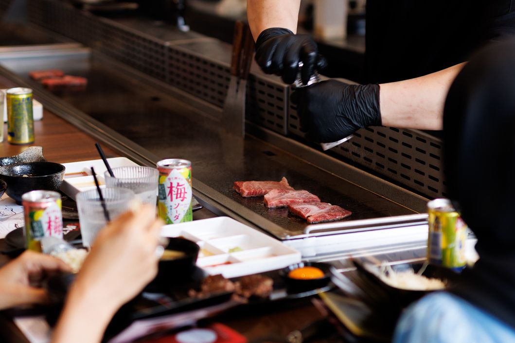 Guests getting their meat grilled in front of them at Mittoappu