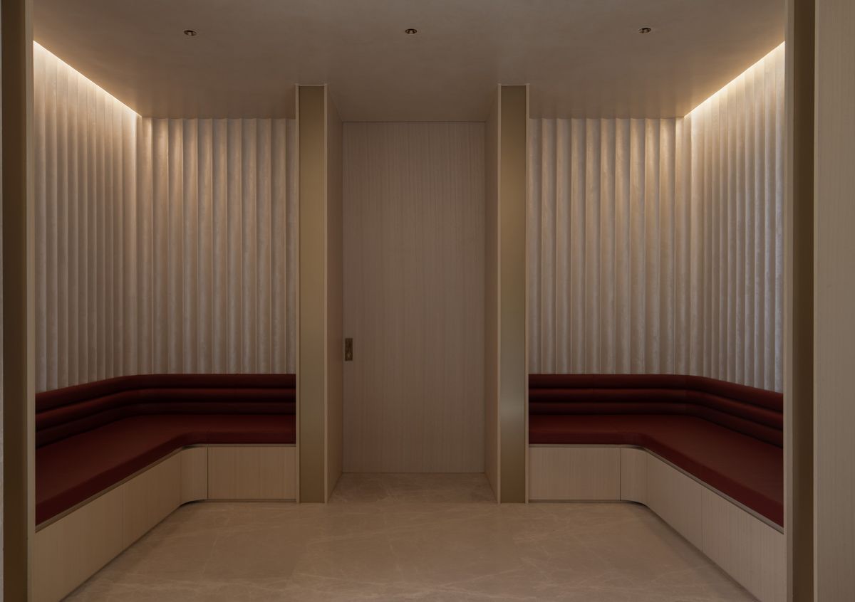 Built-in seating with storage base accommodate waiting guests