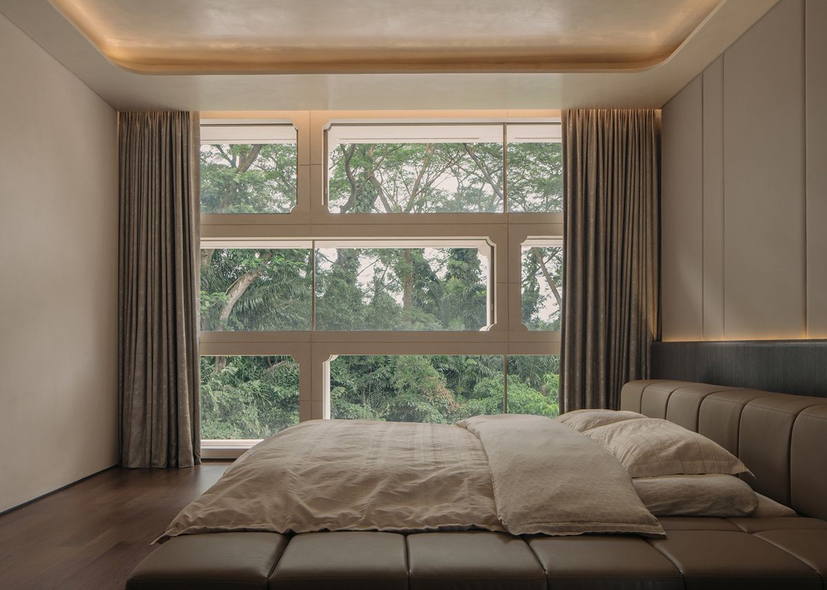 Another of Moongate House’s many bedrooms with a view to the forest
