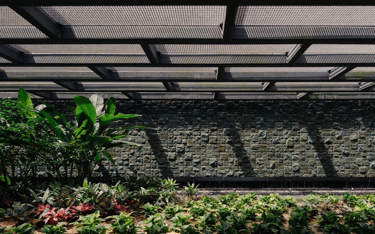 Daylight and passive cooling in action at the Moongate House’s basement—with slit-apertures providing natural ventilation to the carpark beyond