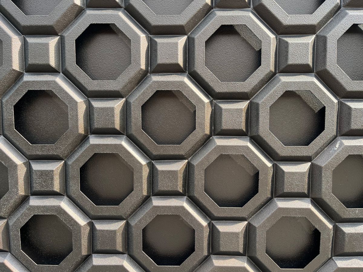 The pattern detail of the Moongate House’s front gate