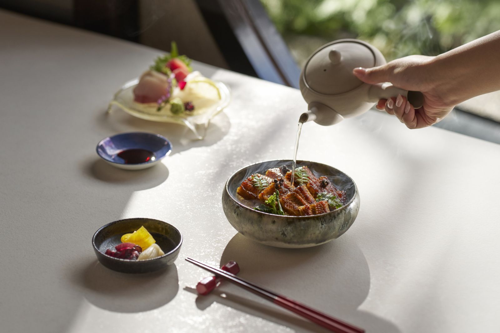 Charcoal-grilled unagi hitsumabushi served with fragrant broth