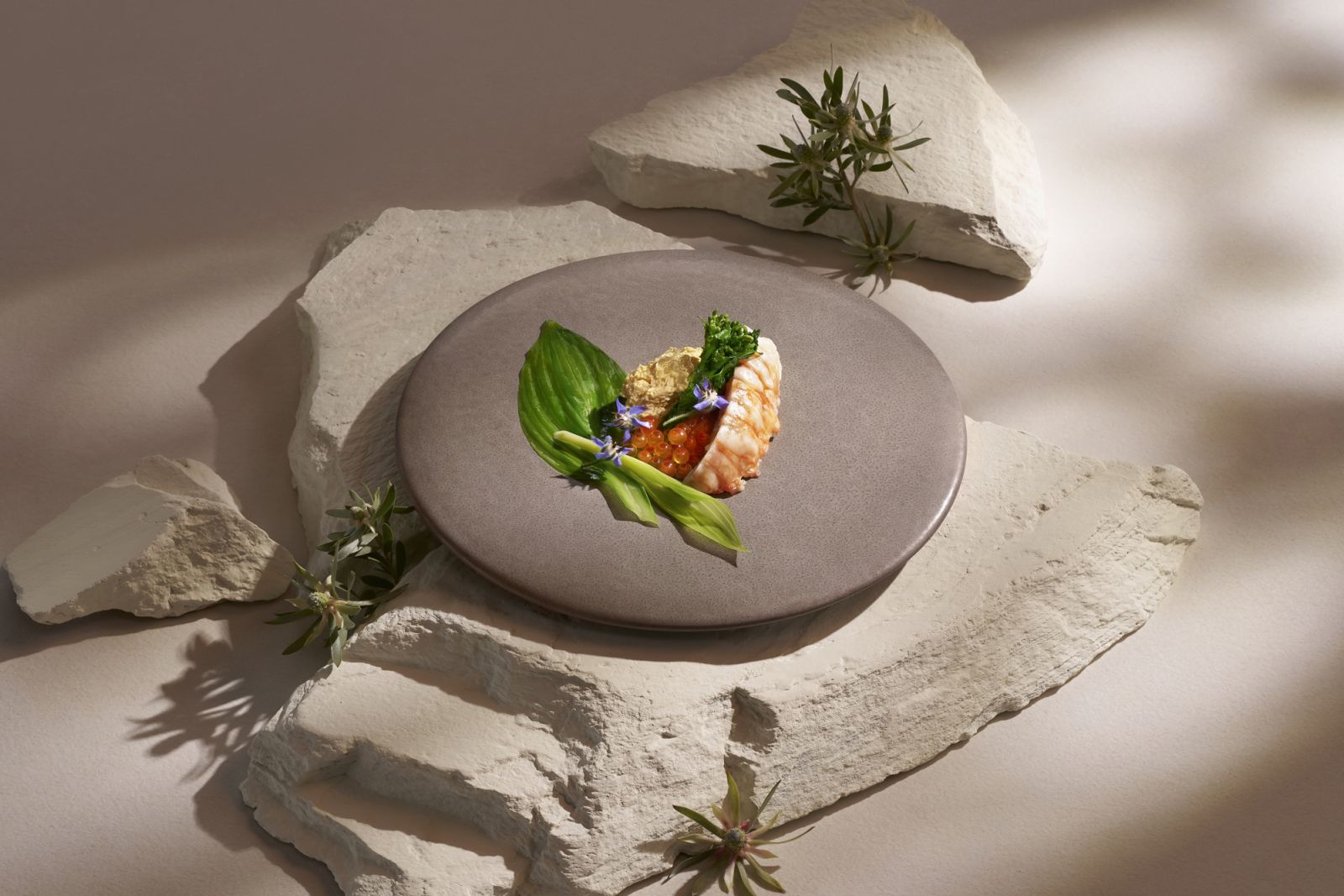 Spiny lobster paired with ikura and a silky white miso Americaine bavarois