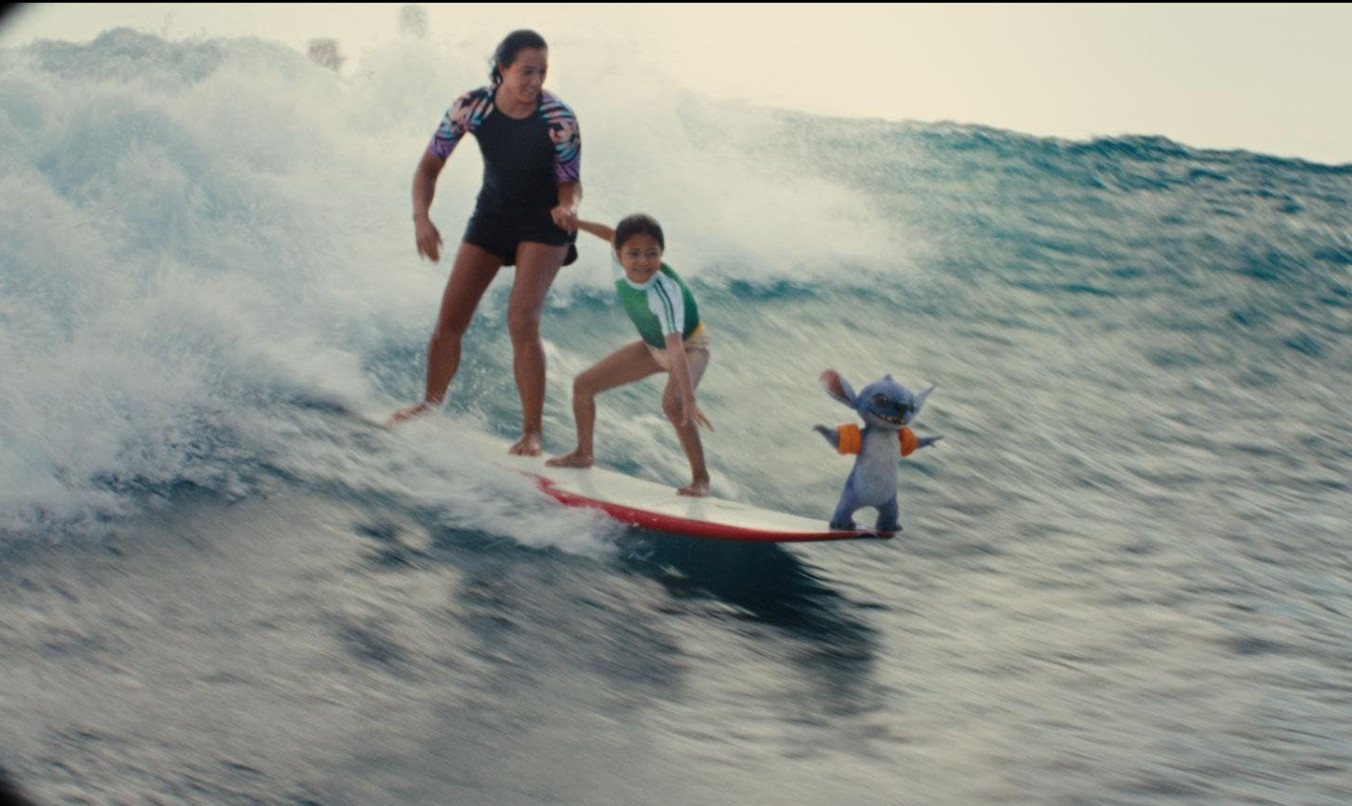 Lilo, Stitch and Nani surfing (Photo: IMDB)