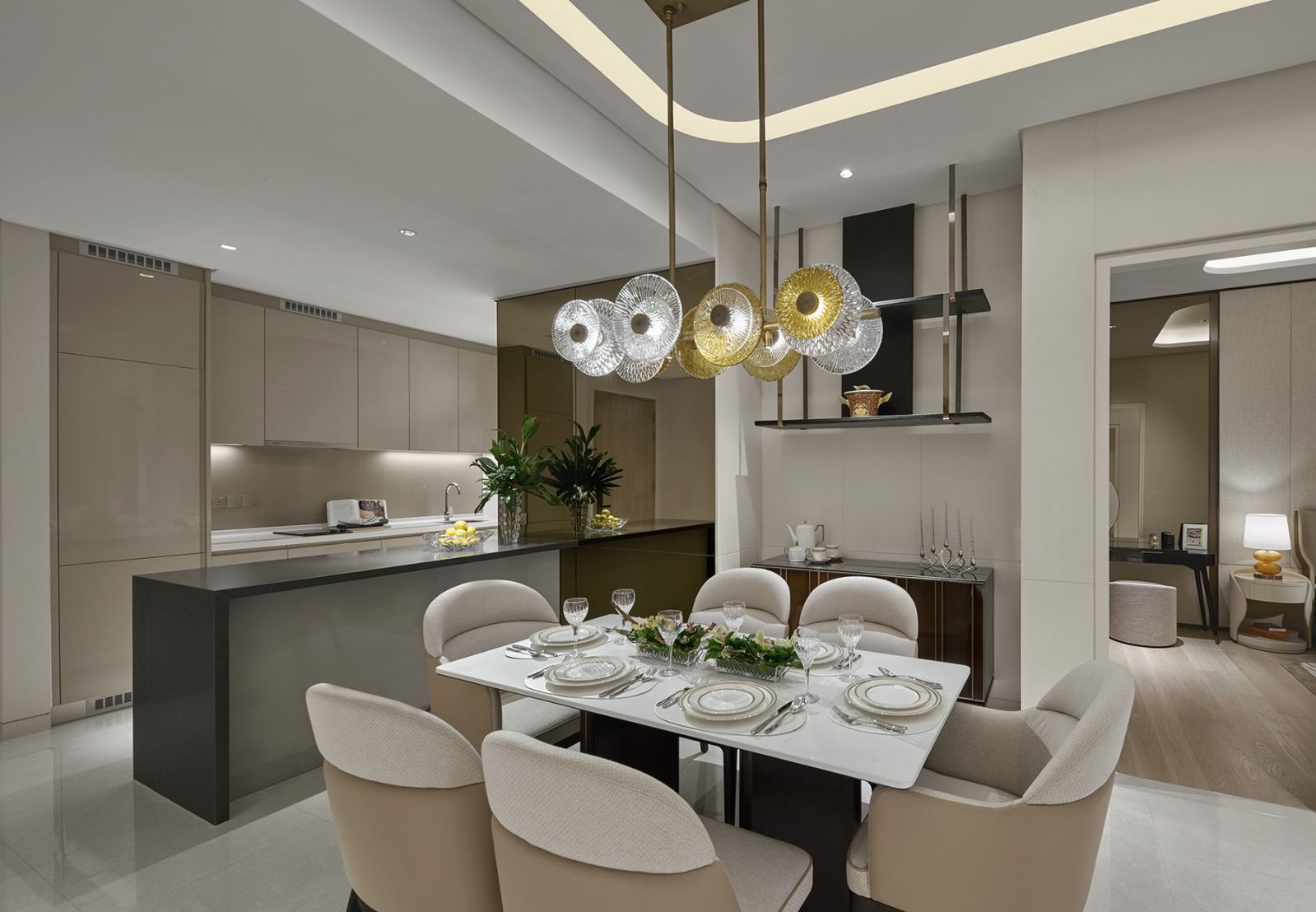 The kitchen opens to the living area while incorporating a discrete laundry zone, maximising utility while preserving visual continuity throughout