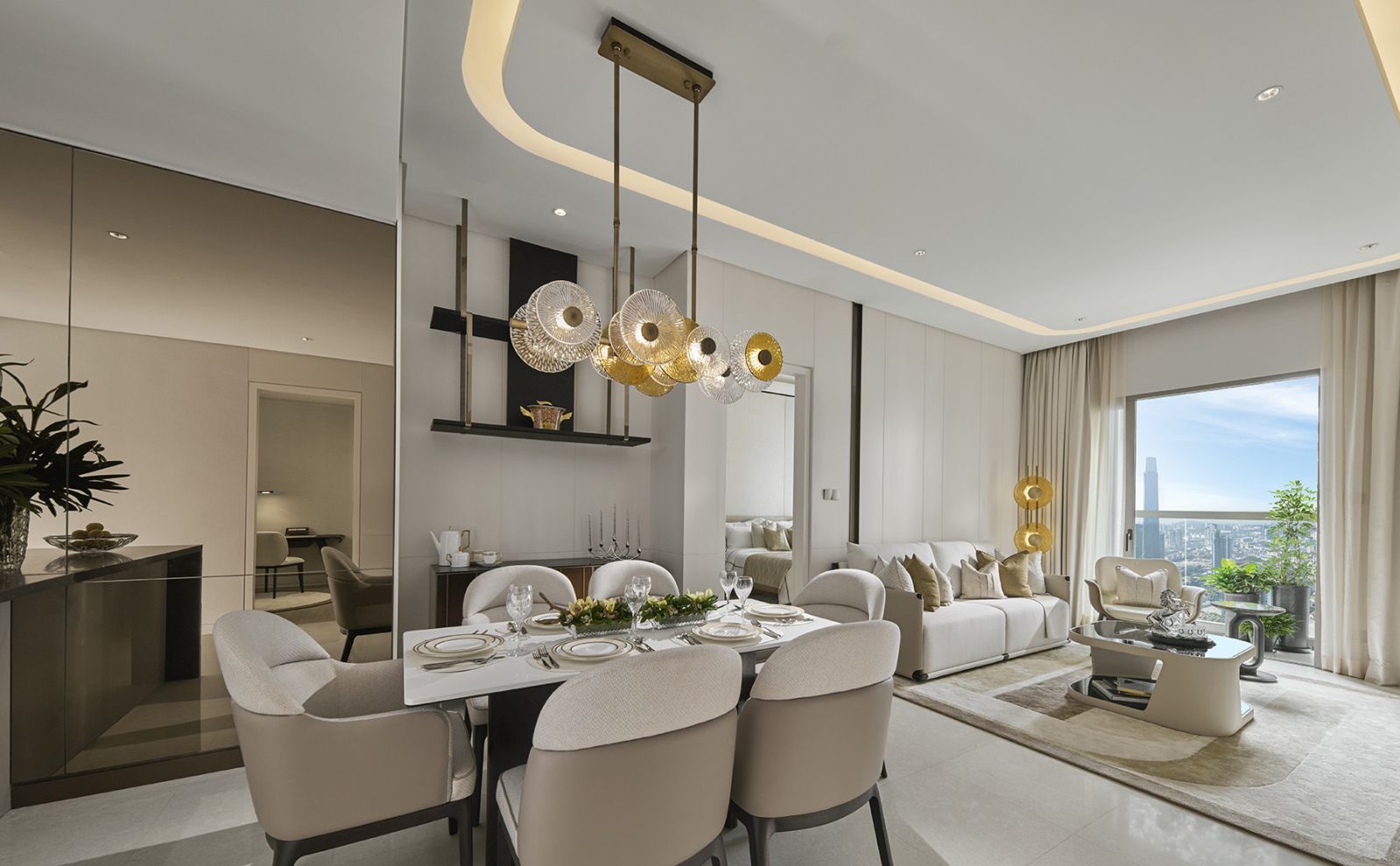 The open-plan living and dining area demonstrates the designers’ priority allocation of space, creating generous communal zones that anchor daily life in the 1,272-square-foot apartment