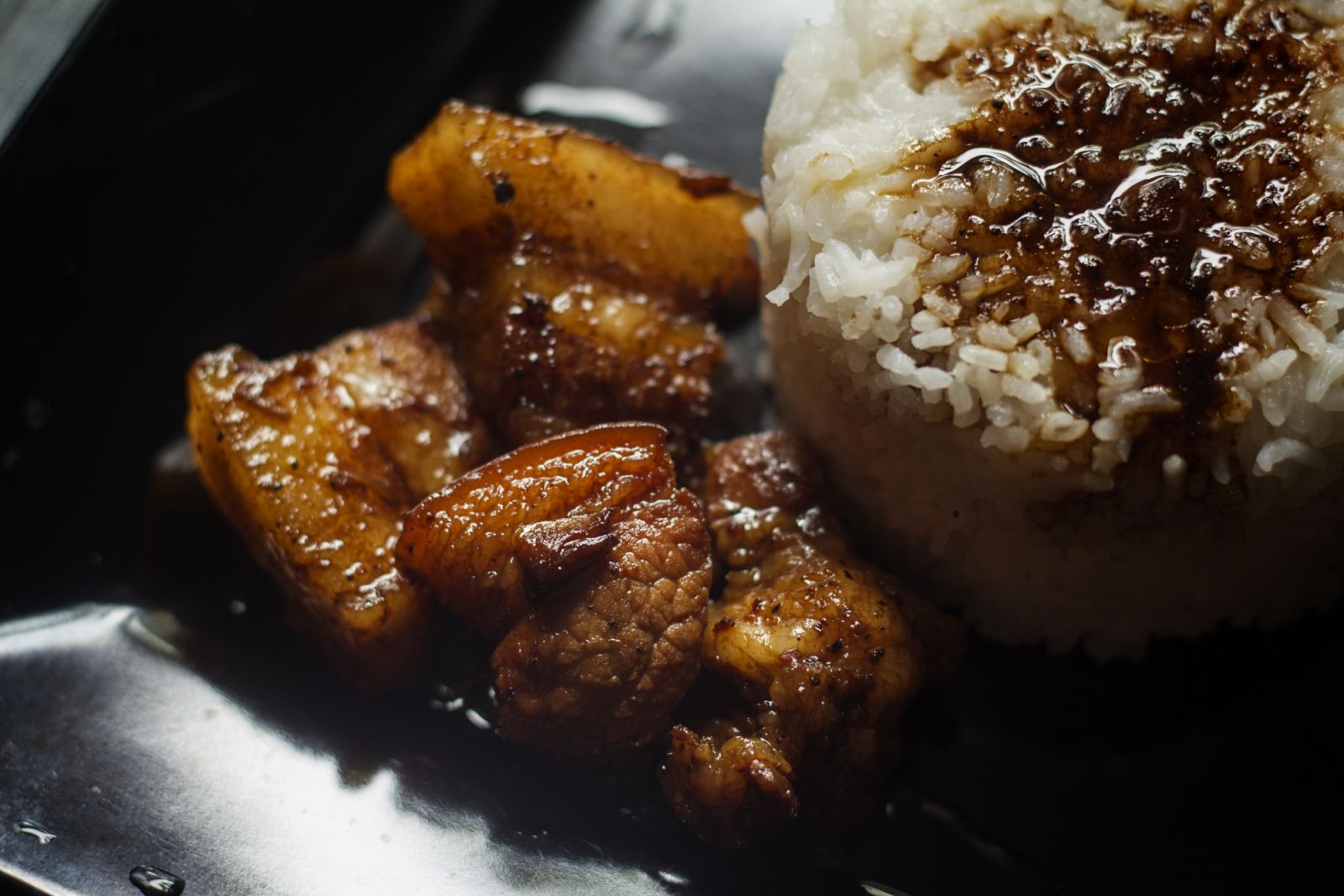 The Filipino adobo mixed with white rice (Photo: Getty Images)
