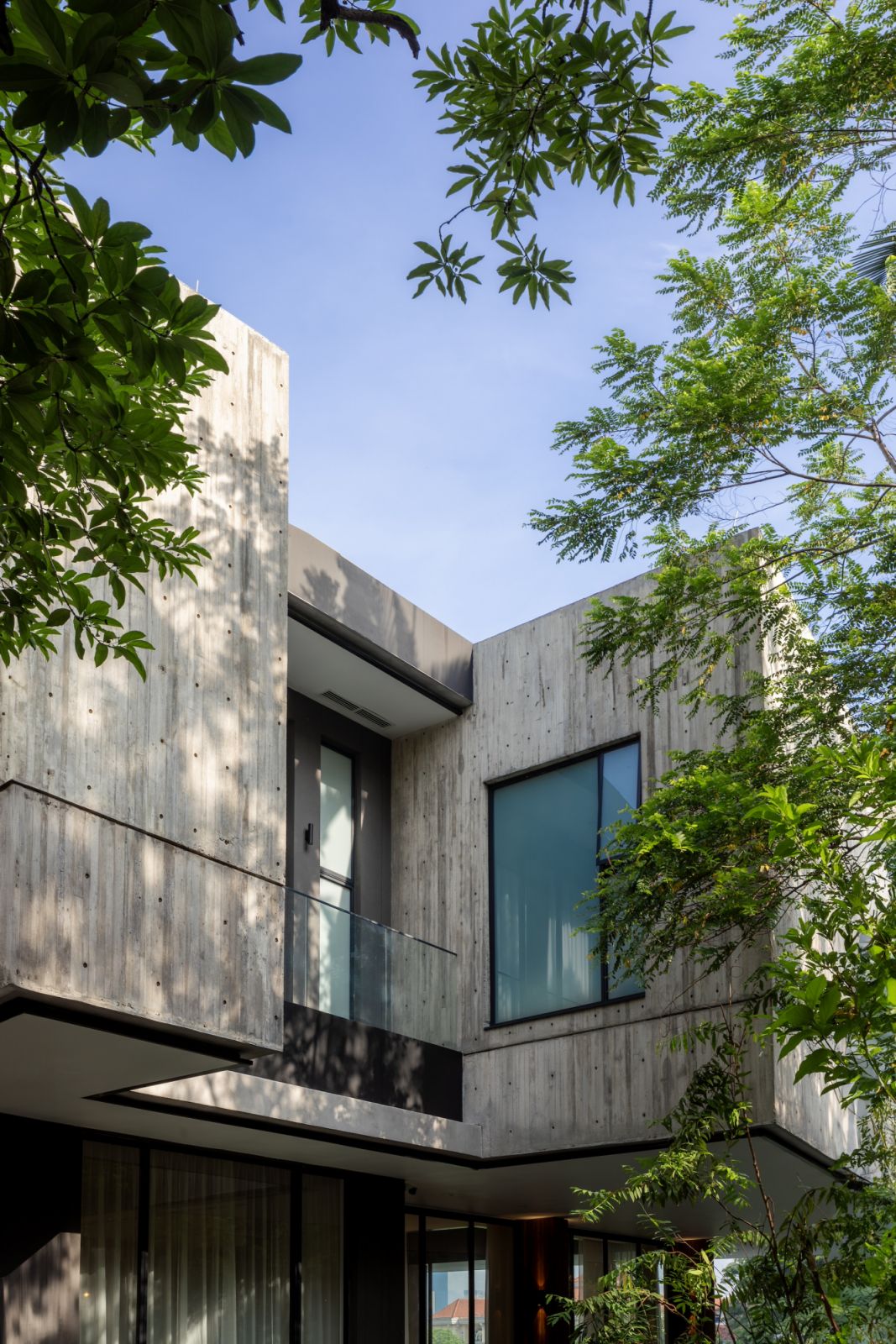 A bold composition of overlapping concrete planes and dynamic cantilevered elements