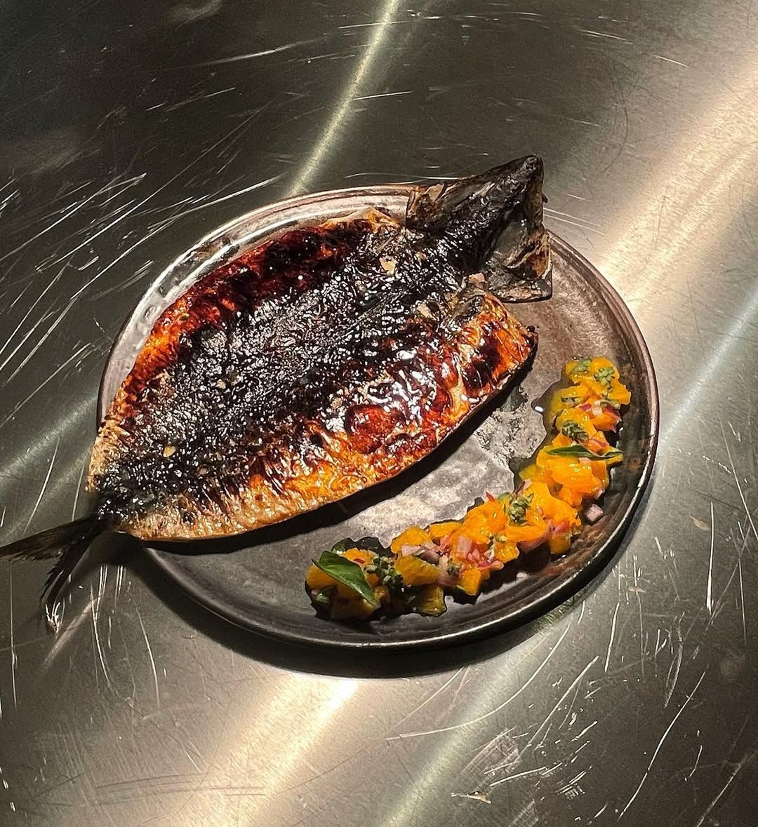 Grilled saba with orange salsa (Image: @o.rang__kl)
