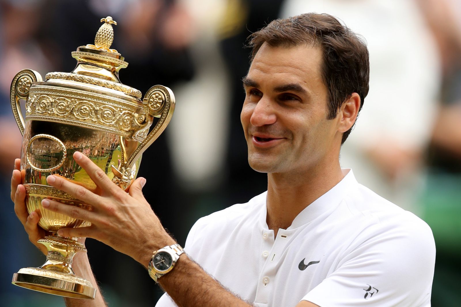 Roger Federer winning his eighth Wimbledon title, with the Rolex Datejust with the “Wimbledon” dial on his wrist (Photo: Getty Images)