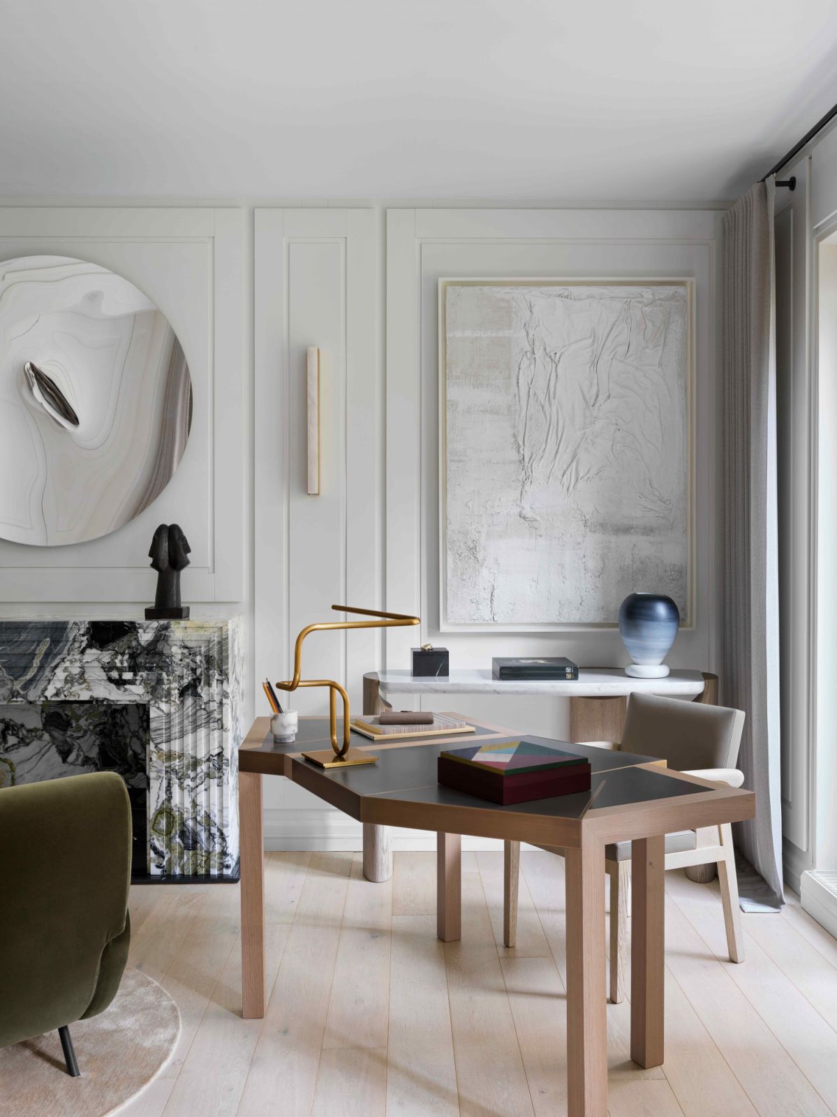 The designated workspace with a Dinant work desk by Bruno Moinard
