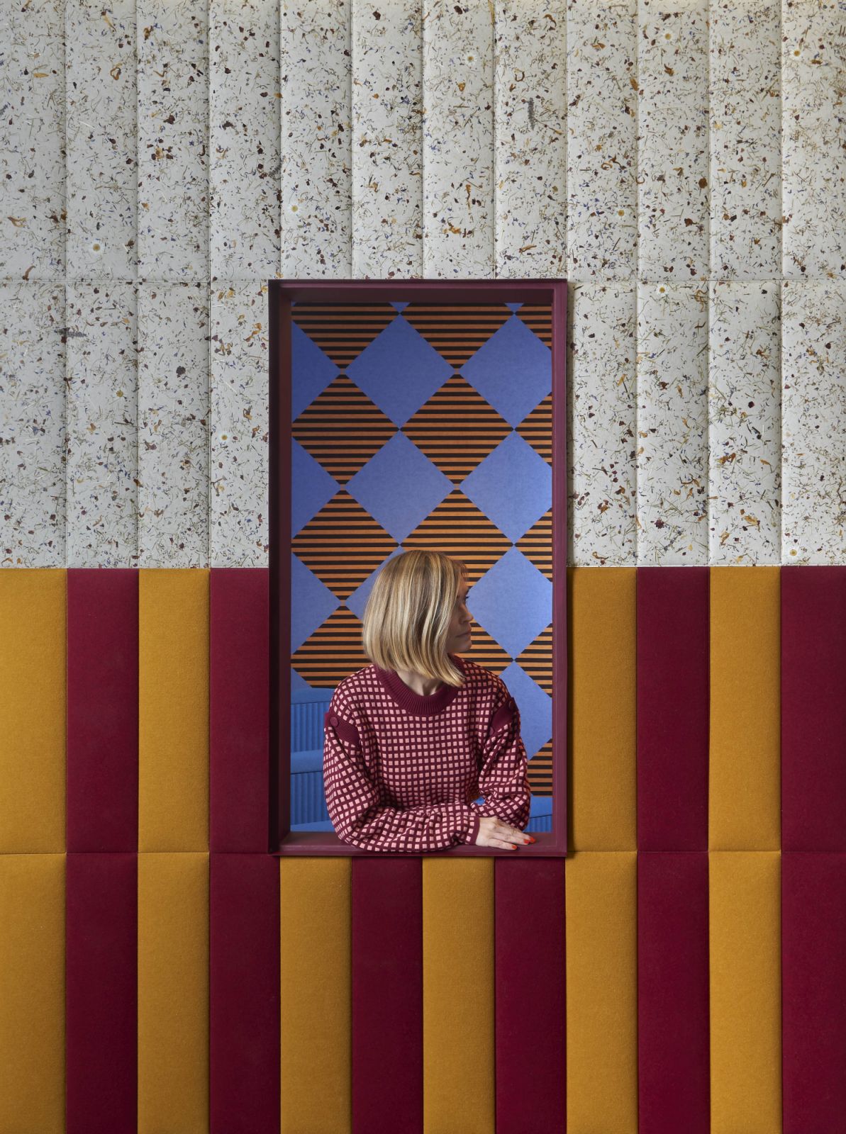 Swedish interior designer Tekla Severin photographed at Slalom’s striking booth at the Stockholm Furniture Fair, which she conceptualised using acoustic panels from the brand such as Arlecchino, which she also designed