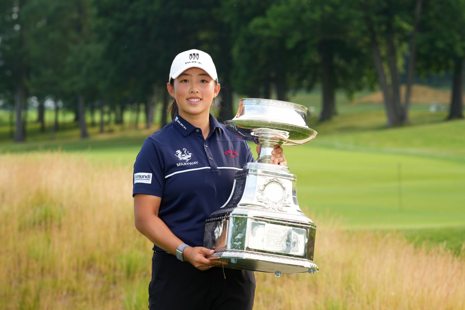 SPRINGFIELD, NJ - JUNE 25: Winner, Ruoning Yin poses with the trophy after the final round of the KPMG Women's PGA Championship at Baltusrol Golf Club on Sunday, June 25, 2023 in Springfield, New Jersey. (Photo by Darren Carroll/PGA of America)