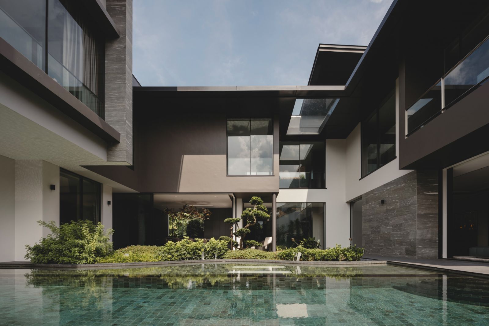 A large pool presides over the courtyard