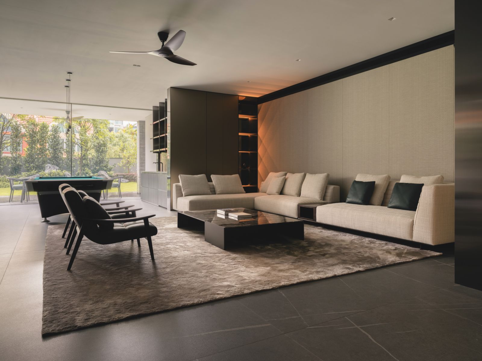 This living room features the Minotti Roger sofa, Fynn armchairs and Linha coffee table