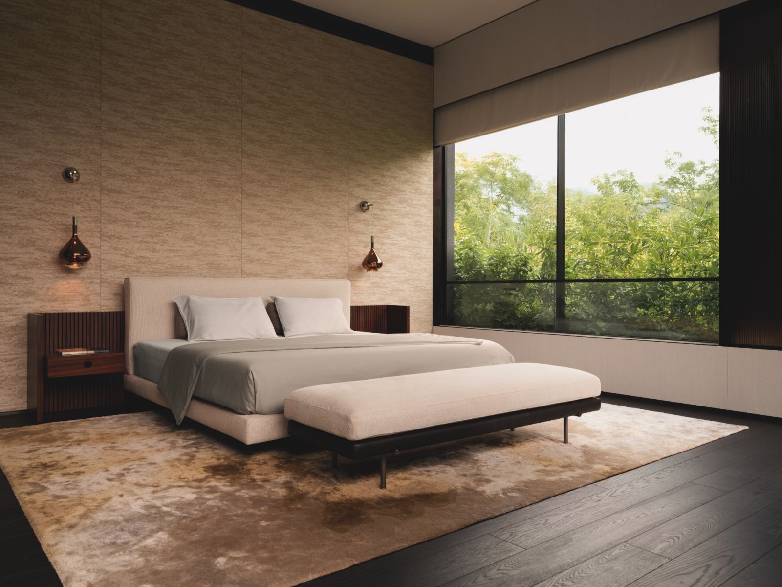 Lodes Skyfall pendant lights stylishly flank the Minotti Brasilia bed in the master bedroom