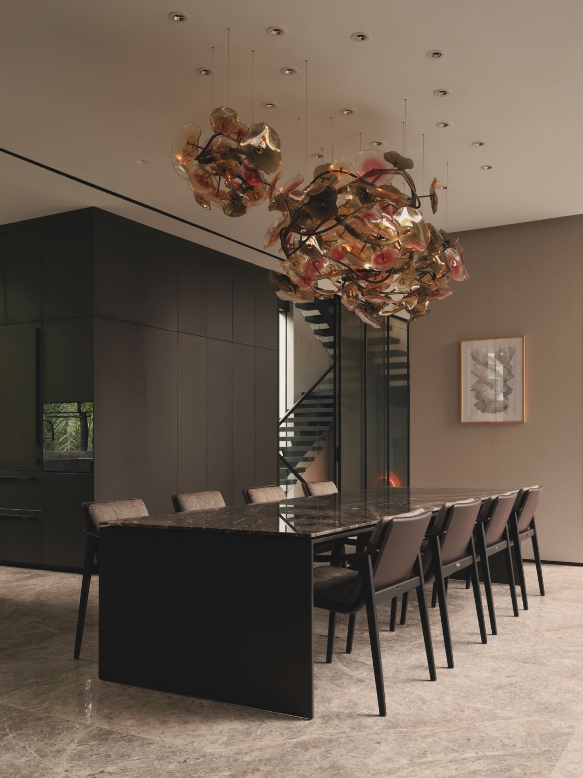 The formal dining area is furnished with the Minotti Linha dining table in Giorgio Orobico marble and Fynn dining chairs