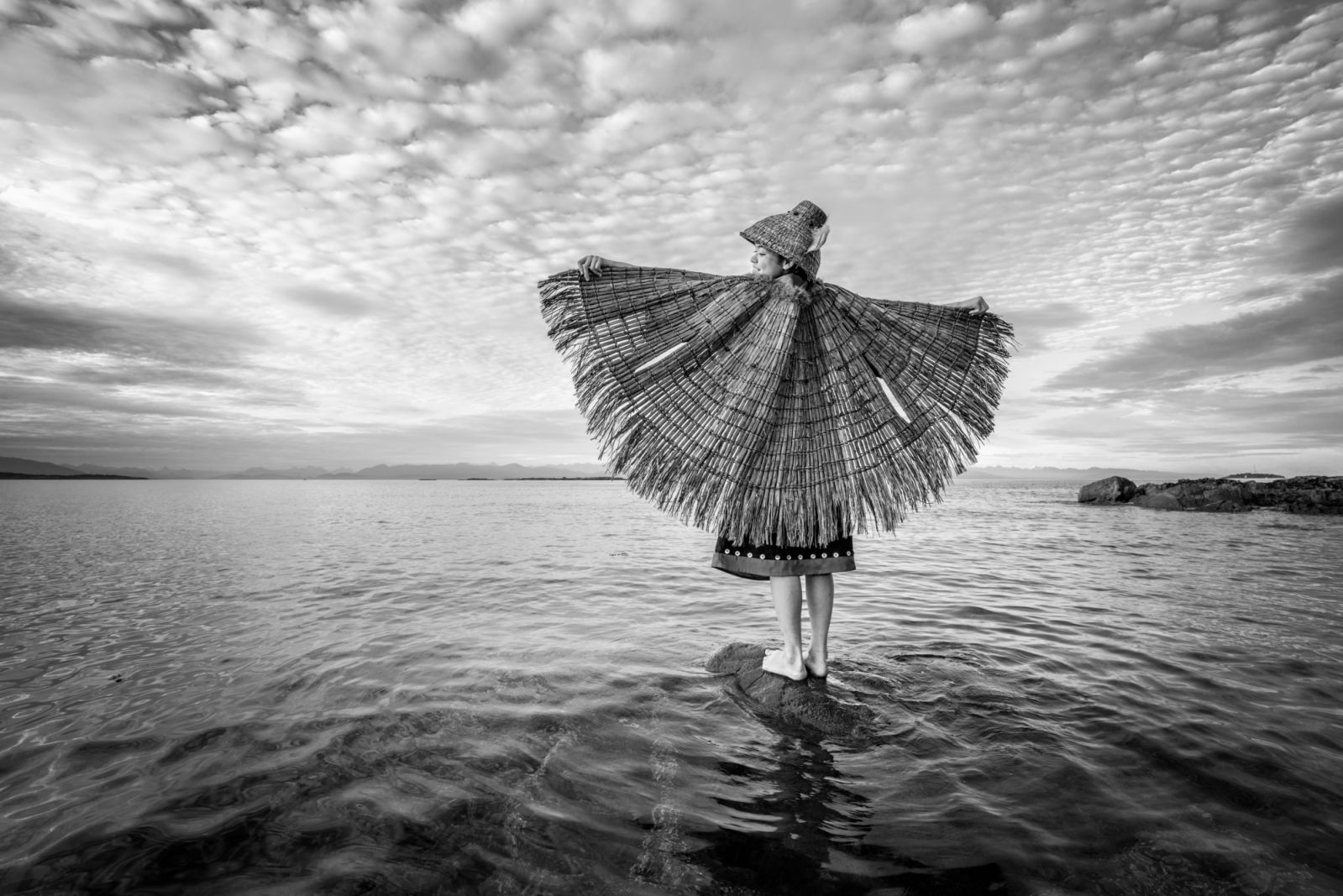 Ta’Kaiya Blaney is a member of the Tla A’min Nation, an environmental activist, award-winning actress and singer, and ambassador for the Native Children’s Survival Indigenous Children Fund and Salish Sea Youth Foundation. Cristina Mittermeier met her for a shoot on the shores of Vancouver, where she photographed her wearing traditional clothing.