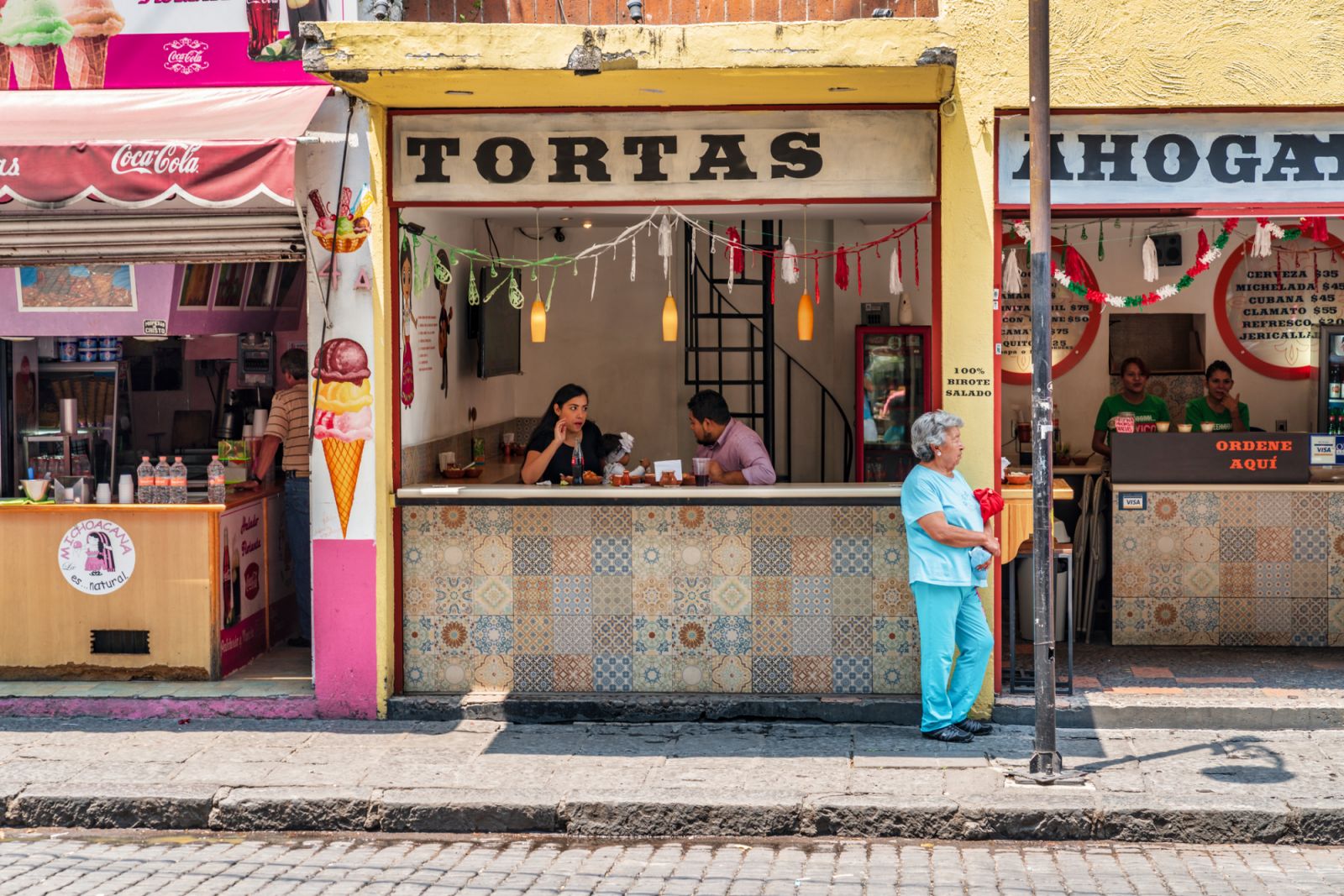 Coyoacan district street scene in Mexico City. Photo taken during a warm summer afternoon.