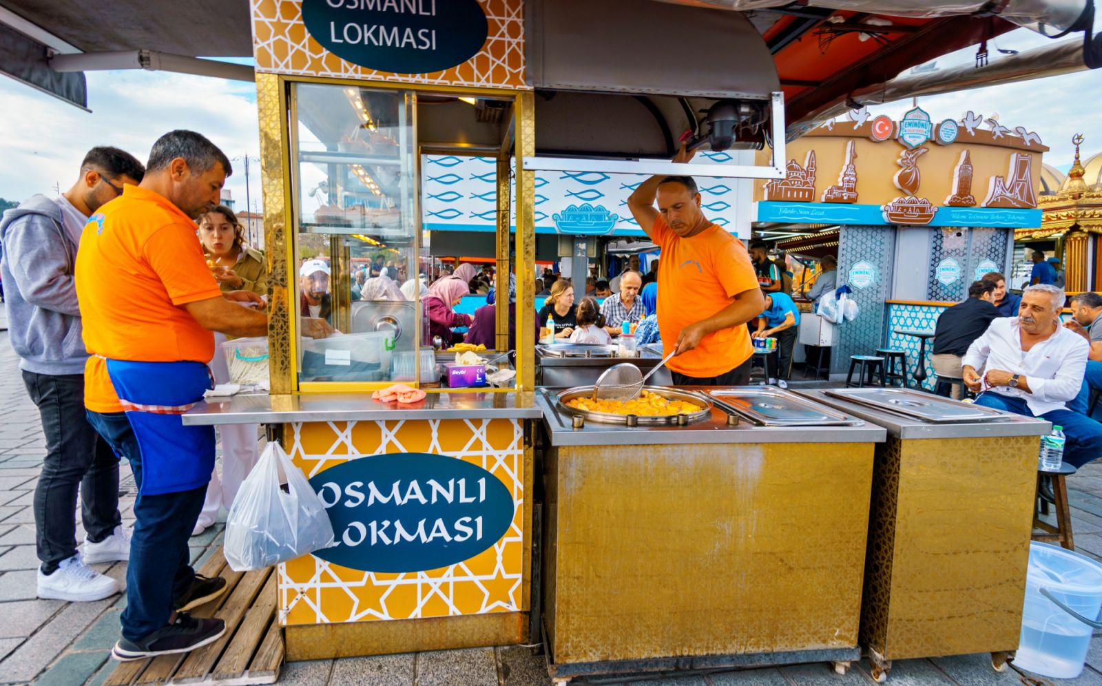 Istanbul, Turkey - October 10, 2024: Street food kiosk, national turkish food, urban life and street views, random people