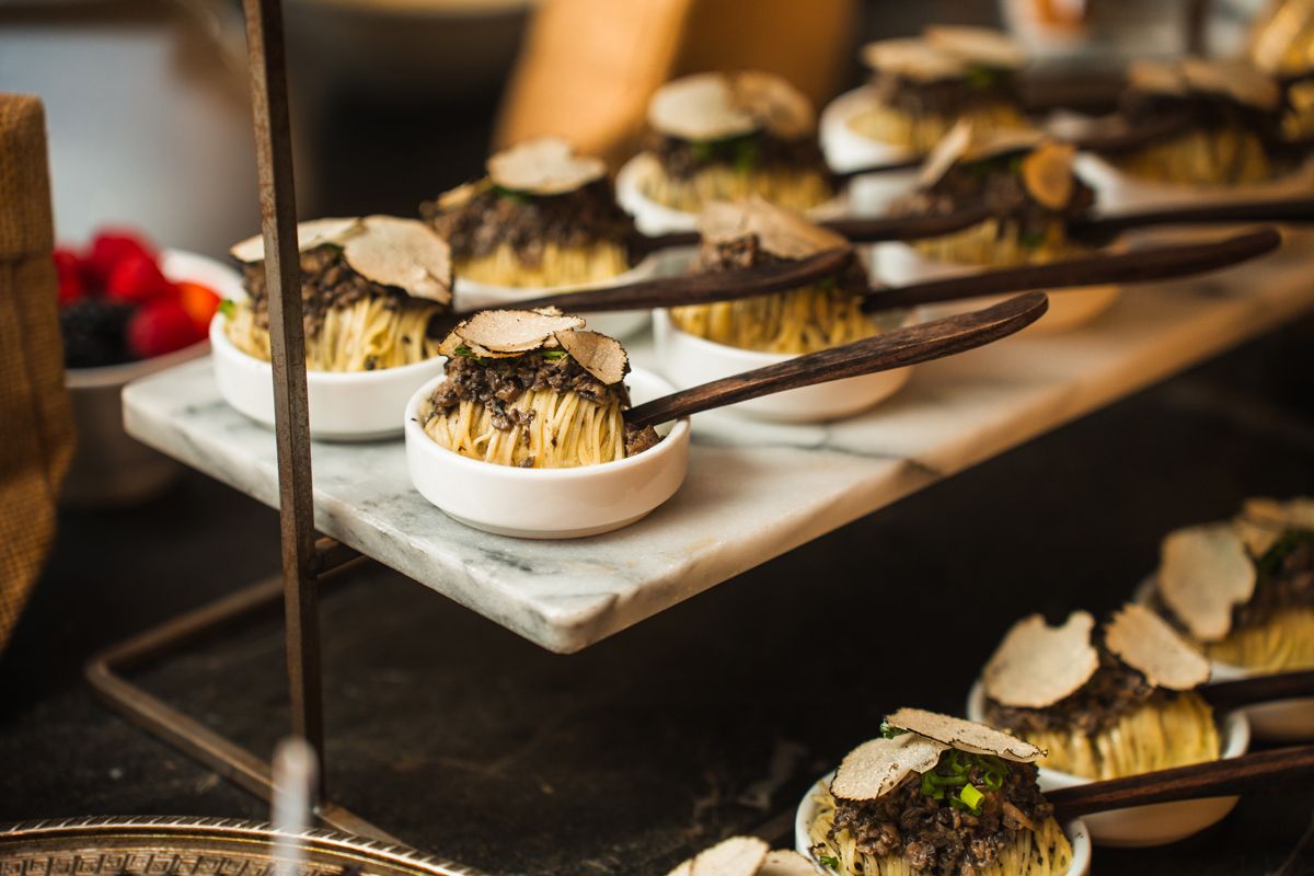 Handcrafted angel hair pasta with wild mushroom duxelles, fresh truffle shavings and spring onion confit