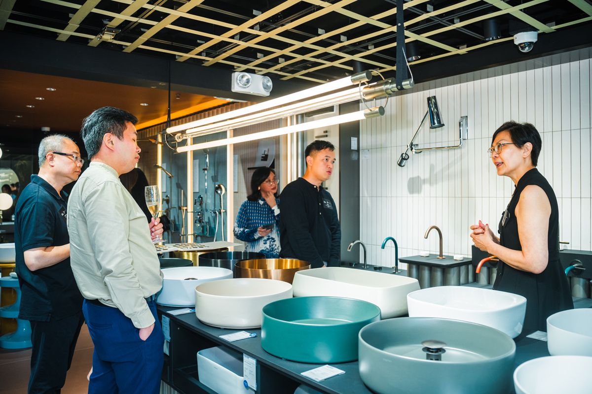 Liz Yang walking the guests through the Zuchetti showcase at the Hafary House