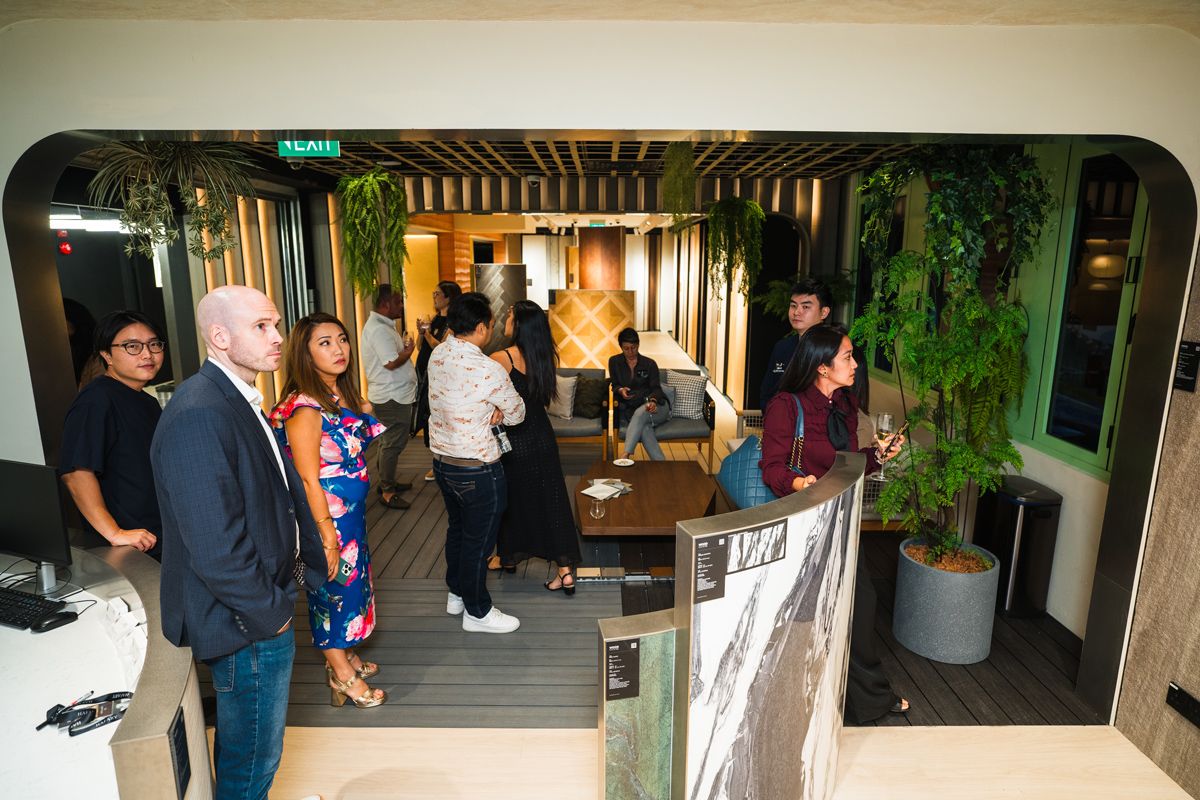 Guests exploring the Wood Culture showcase at the Hafary House