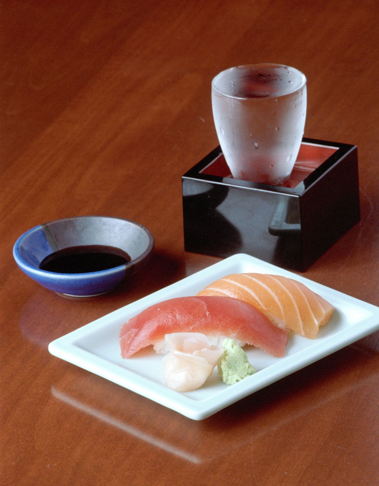 KUBO'S SUSHI BAR AND GRILL
5/14/02--Tuna and fresh salmon sushi is served with sake and soy sauce at Kubo's restaurant at 2414 University in the Rice Village. The garnish is made with pickled ginger and wasabi. HOUCHRON CAPTION (05/24/2002): Tuna and fresh salmon sushi are served with sake and soy sauce at Kubo's Sushi Bar & Grill in Rice Village. (Photo by Steve Campbell/Houston Chronicle via Getty Images)