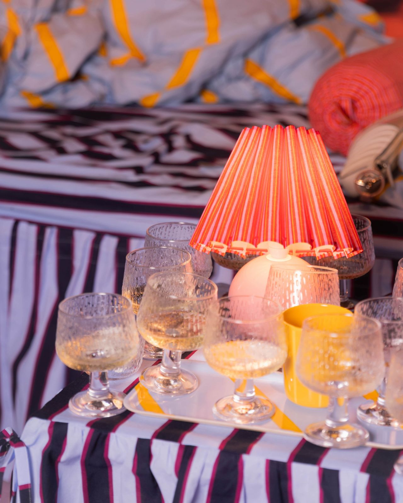 The installation celebrated Marimekko’s launch of a new bedding collection, along with complementary home accessories—like this table lamp