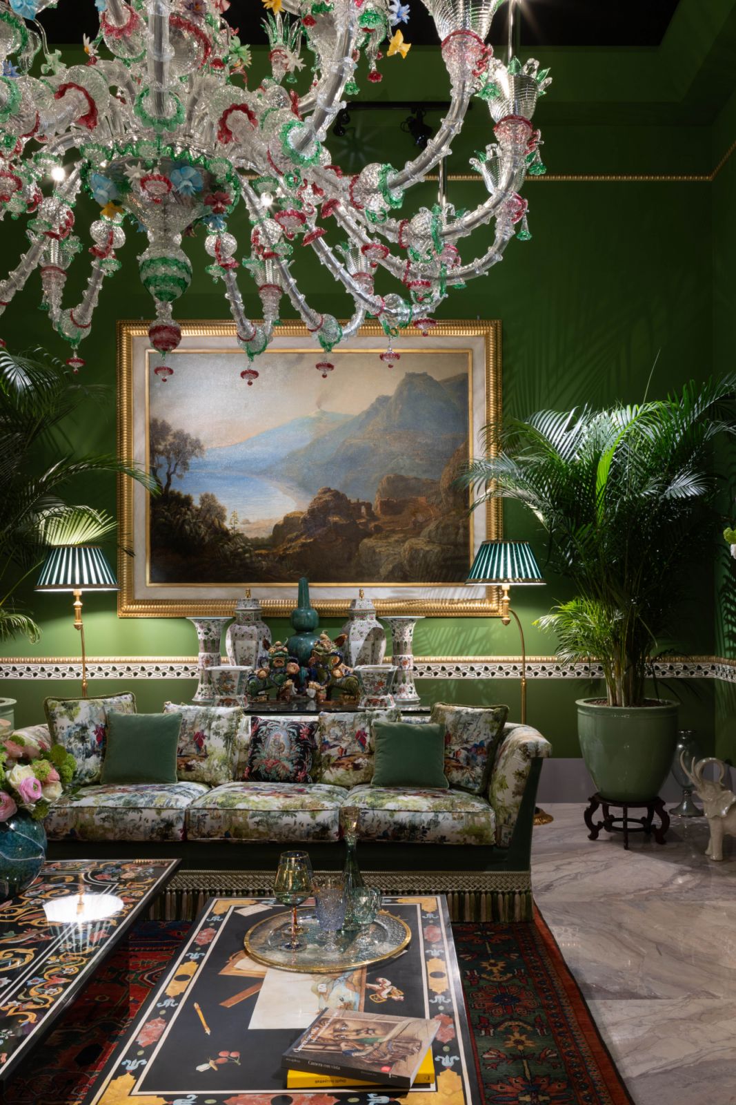 A green winter garden, anchored by a chandelier of organic, curling forms, embraced a baroque spirit