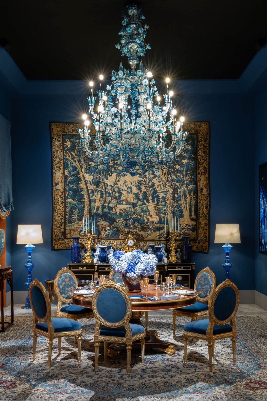 A blue-hued dining room, fit for royals of any era