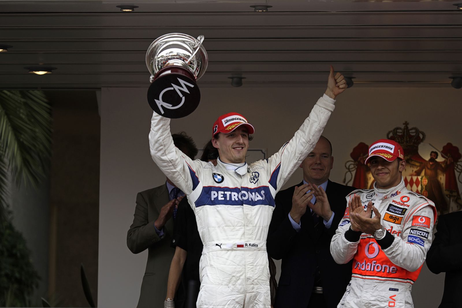 Robert Kubica, Lewis Hamilton, Grand Prix of Monaco, Circuit de Monaco, 25 May 2008. Robert Kubica celebrating his second place in the 2008 Monaco Grand prix, with winner Lewis Hamilton applauding. (Photo:Getty Images)