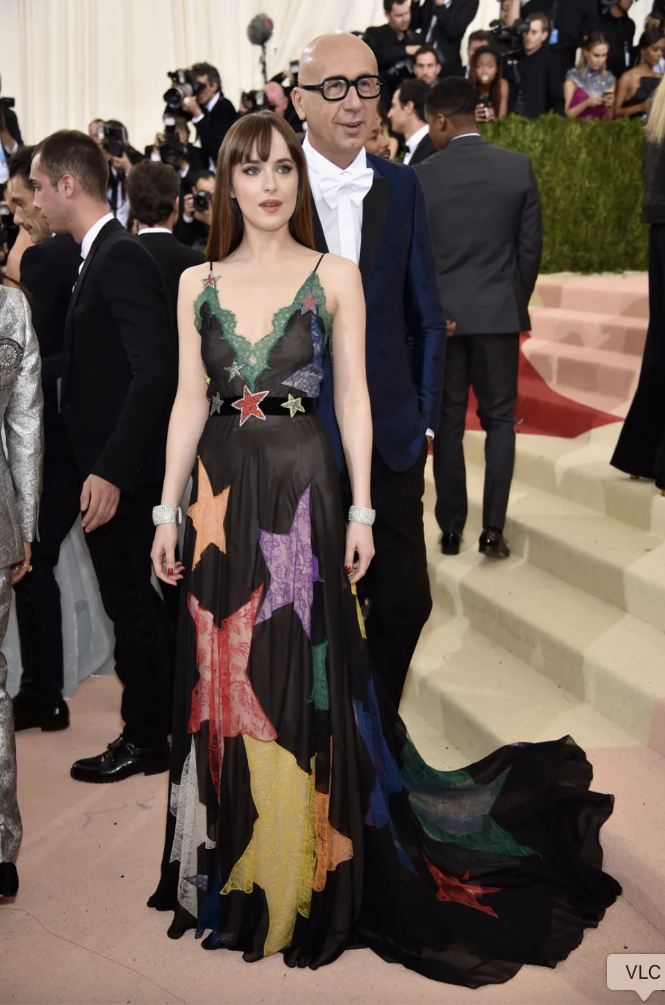 Dakota Johnson attends the 2016 Met Gala in a custom star-patterned Gucci gown from the Alessandro Michele era (Photo: Getty Images)