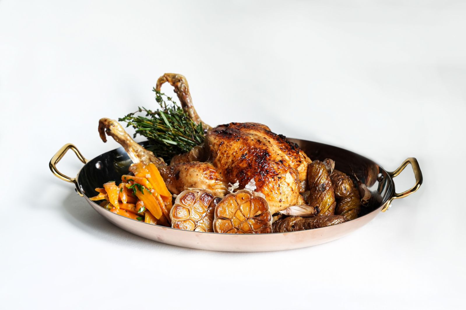 Rotisserie-roasted demi-poulet paired with sriracha at The Plump Frenchmen (Photo: Zouk Group) bugis food restaurant guide