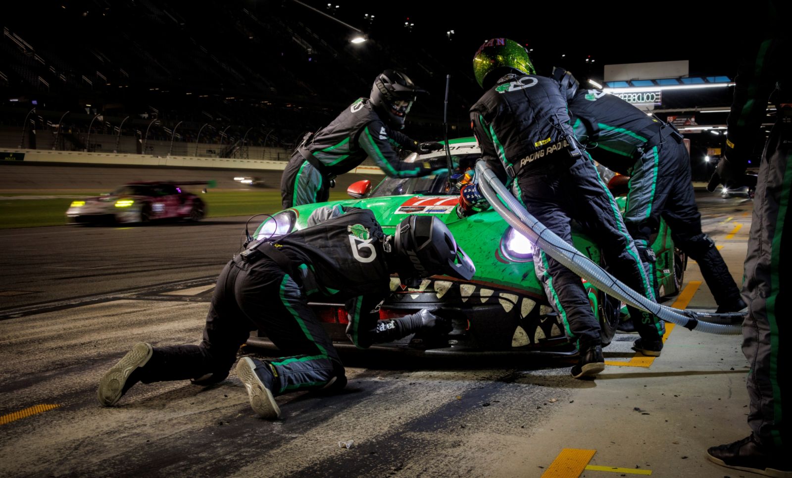 Action in the pits during the 2025 Rolex 24 At Daytona

#77 AO Racing, Porsche 911 GT3 R (992), GTD Pro; Laurin Heinrich (DEU), Klaus Bachler (AUT), Alessio Picariello (BEL)