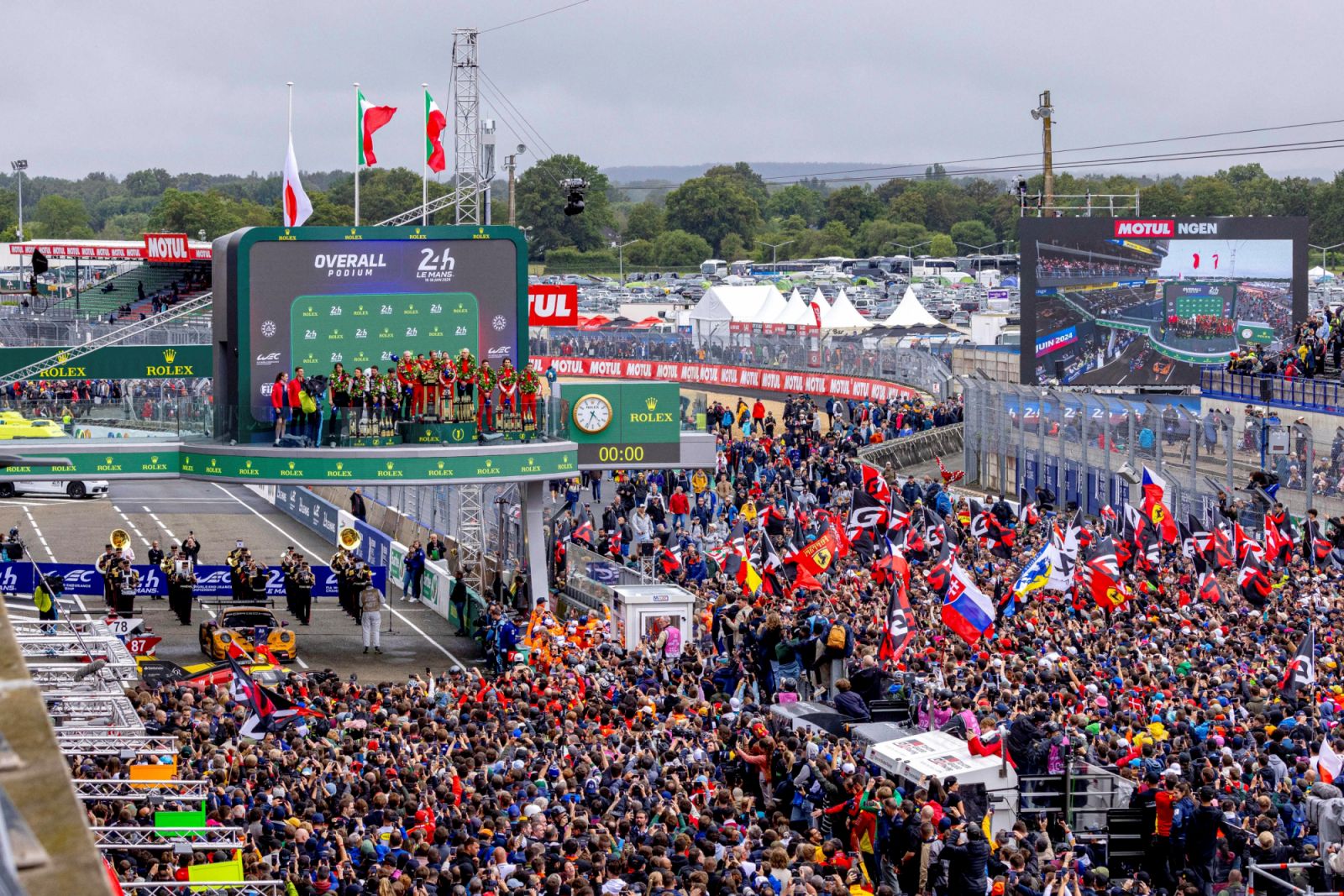 Antonio Fuoco (ITA), Miguel Molina (ESP) and Nicklas Nielson (DNK), drivers of #50 FERRARI AF CORSE, Ferrari 499P, celebrate on the podium at Parc Ferme after winning the overall title in this year’s 24 Hours of Le Mans, alongside second place #7 TOYOTA GAZOO RACING, Toyota GR010 - Hybrid; Jose Maria Lopez (ARG), Kamui Kobayashi (JPN), Nyck de Vries (NLD) and third place #51 FERRARI AF CORSE, Ferrari 499P; Alessandro Pier Guidi (ITA), James Calado (GBR), Antonio Giovinazzi (ITA)