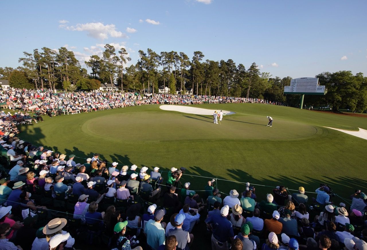 Hideki Matsuyama of Japan putts on No. 18 during the final round of the Masters at Augusta National Golf Club, Sunday, April 11, 2021.