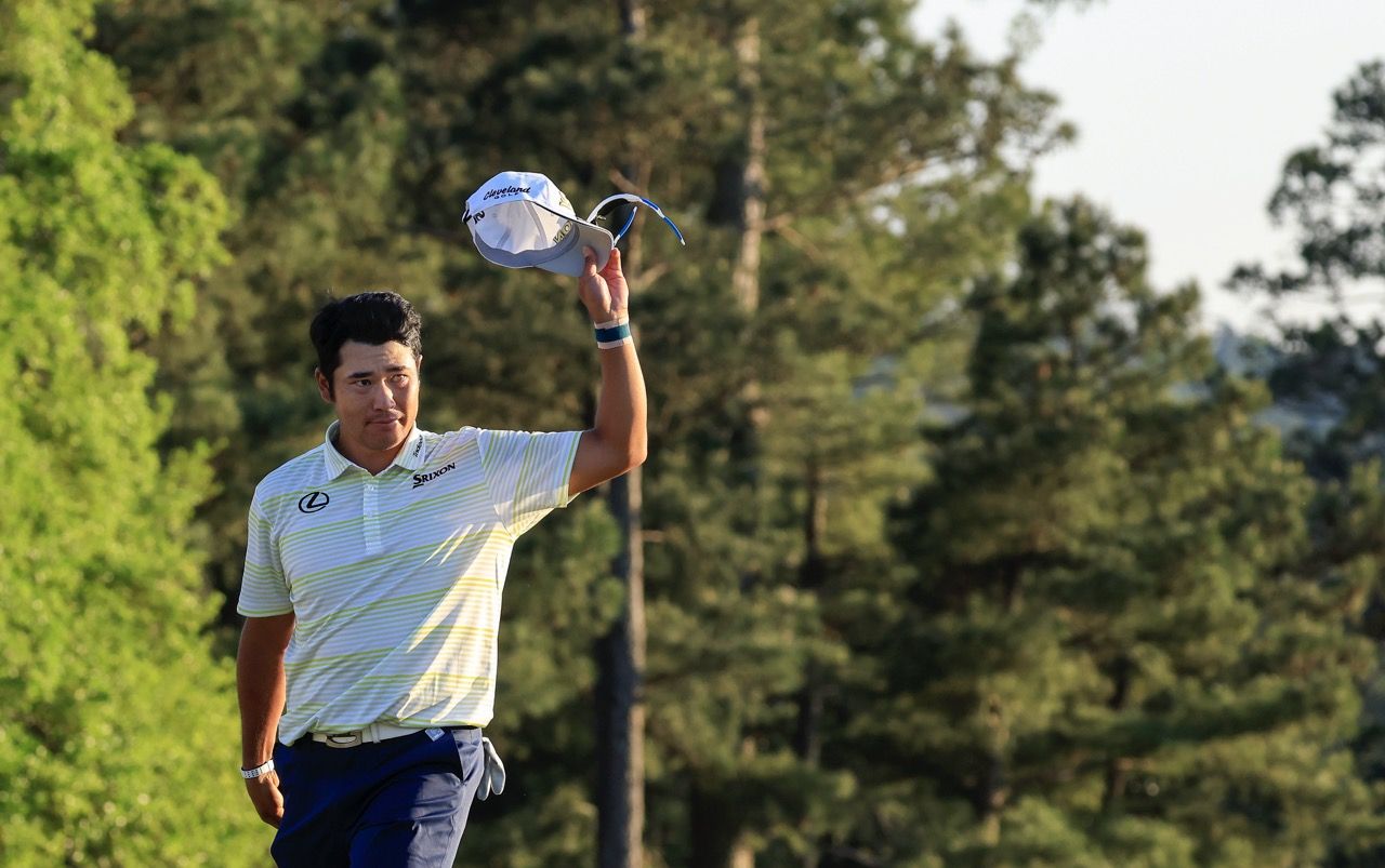 Hideki Matsuyama of Japan celebrates on the No. 18 green after winning during the final round of the Masters at Augusta National Golf Club, Sunday, April 11, 2021.